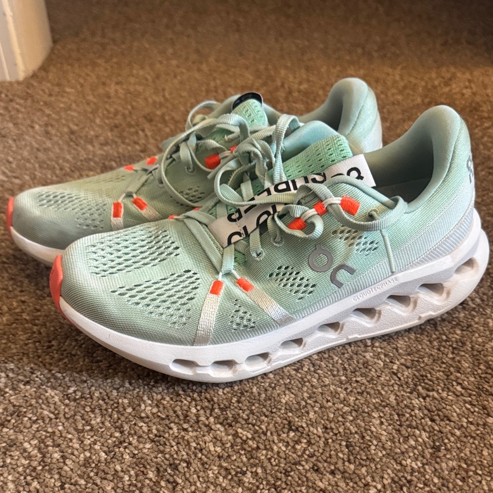 On Running Cloudstratus Sneakers in Mint and Coral